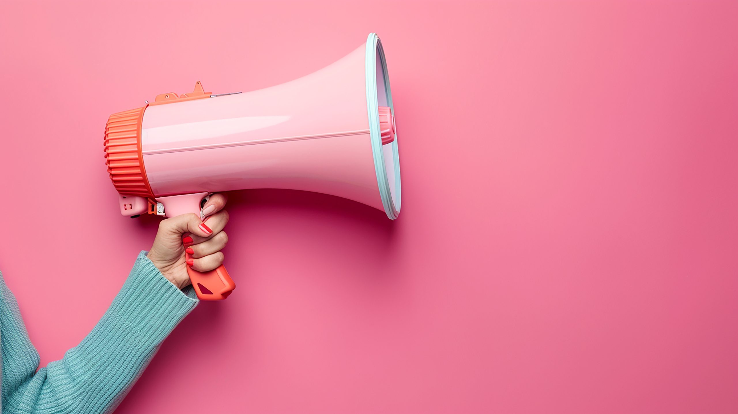 person-holding-megaphone-with-words-it (1)